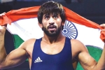 Bajrang Punia in new york, Bajrang Punia at Madison Square Guarden, indian wrestler bajrang punia appeals indians to support him at madison square garden, Khel ratna