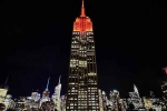Empire State Realty Trust, Empire State Realty Trust, empire state building lit up to honour the festival of lights, Nationality