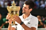 Wimbledon title winner, Novak Djokovic wins Wimbledon, novak djokovic beats roger federer to win fifth wimbledon title in longest ever final, Joker