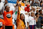howdy modi photos, photos from howdy modi, in pictures narendra modi indian americans at howdy modi, Indian flag
