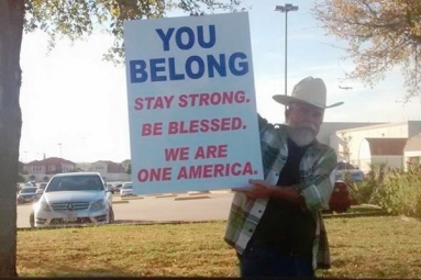 Dallas Man Holds Sign Of Support Outside Islamic Center